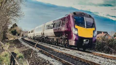 View next to train track of an East Midlands Railway train